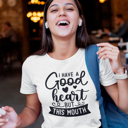 i-have-a-good-heart-but-this-mouth-white-t-shirt-women-sarcastic-funny-mockup-featuring-a-female-student-laughing