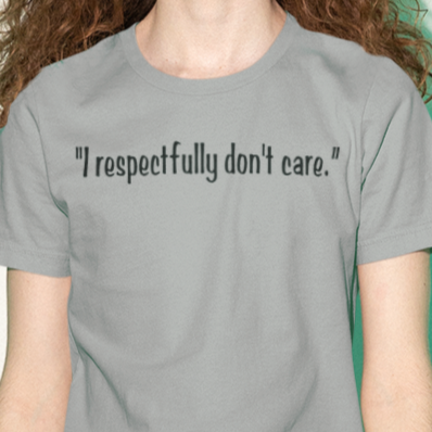 i-respectfully-dont-care-bella-canvas-t-shirt-mockup-of-a-man-with-long-curly-hair-posing-in-a-spotlight