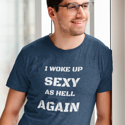 i-woke-up-sexy-as-hell-again-heather-navy-t-shirt-of-a-smiling-man-leaning-on-a-wall
