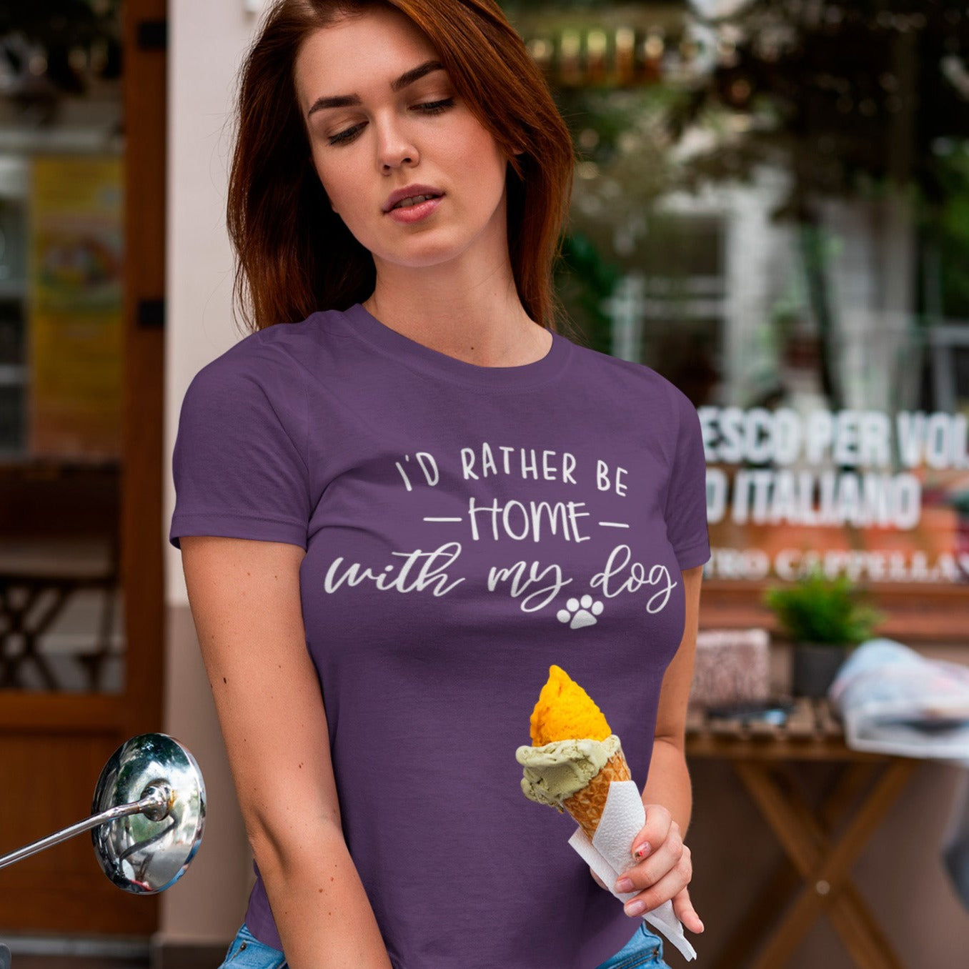 id-rather-be-home-with-my-dog-team-purple-t-shirt-animal-lover-mockup-featuring-a-woman-holding-an-ice-cream-cone