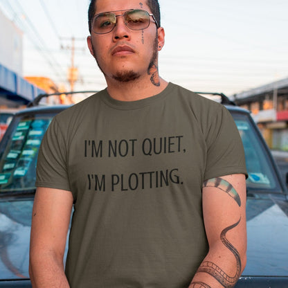 im-not-quiet-im-plotting-army-green-t-shirt-funny-humor-mockup-of-a-tattooed-man-posing-on-the-street