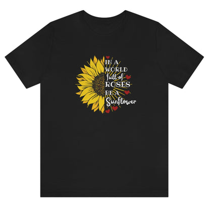 in-a-world-full-of-roses-be-a-sunflower-black-t-shirt-womens