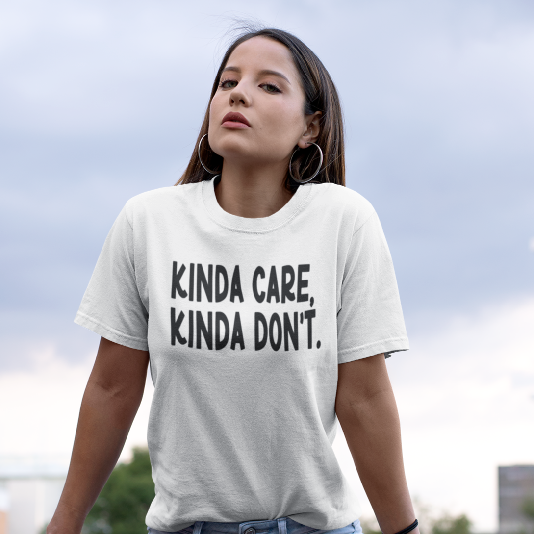 kinda-care-kinda-dont-white-t-shirtmockup-of-a-woman-on-a-shopping-cart-wearing-a-unisex-tee