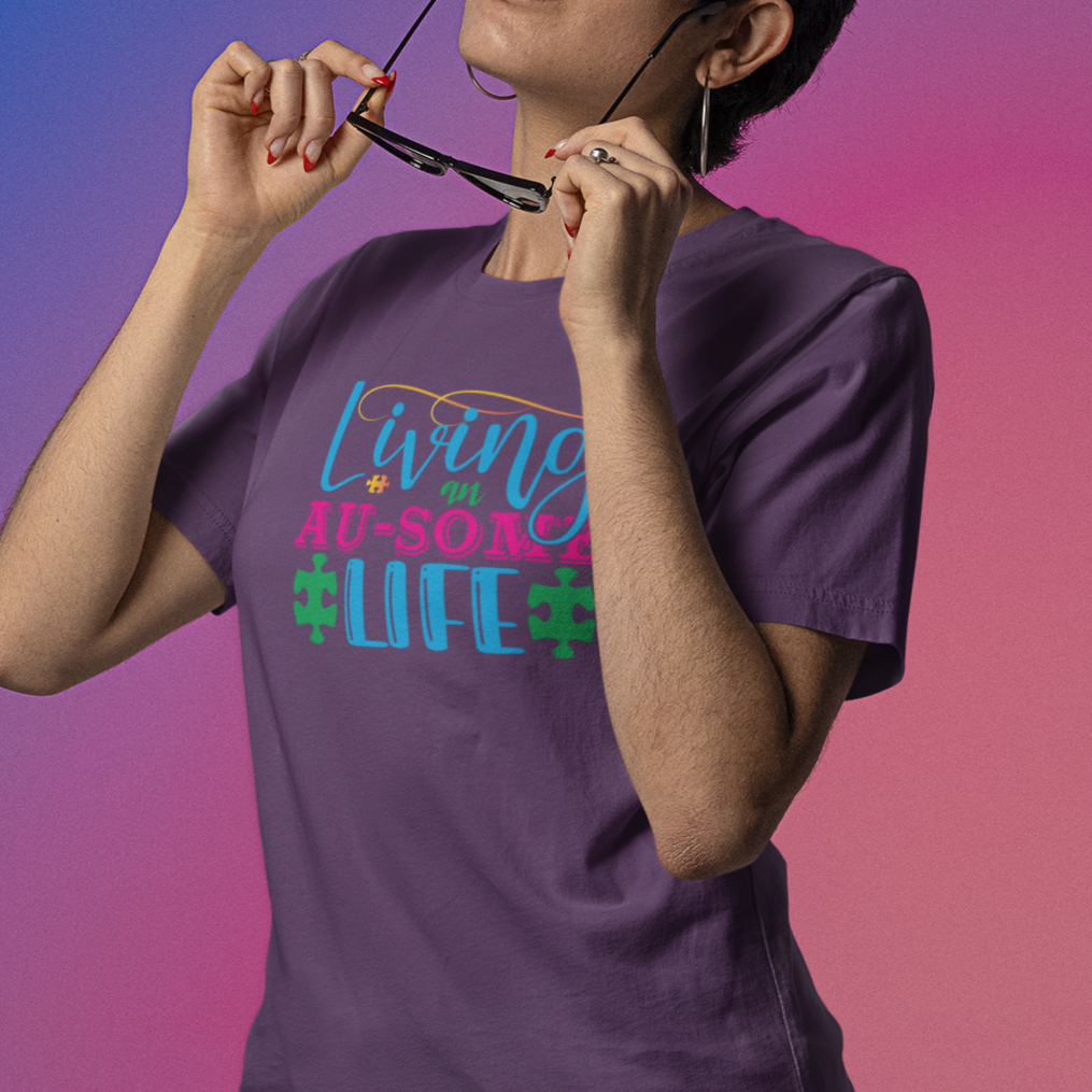 living-an-au-some-life-autism-awareness-month-team-purple-t-shirt-bella-canvas-tee-mockup-featuring-a-woman-taking-off-her-sunglasses