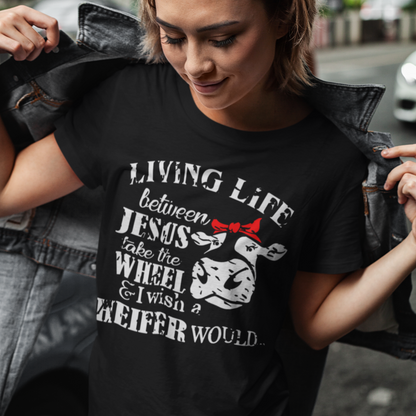 living-life-between-jesus-take-the-wheel-and-i-wish-a-heifer-would-black-t-shirt-mockup-featuring-a-short-haired-woman-at-a-city-street