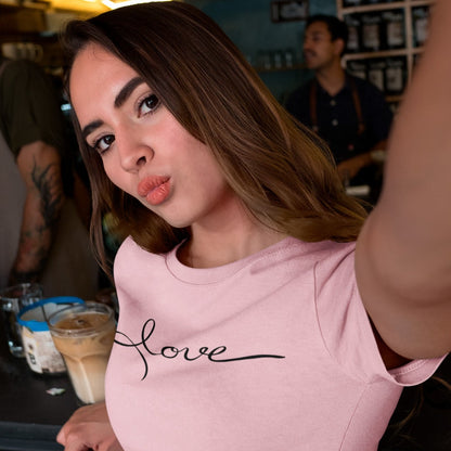 love-pink-t-shirt-womens-woman-taking-a-selfie-while-at-a-coffee-counter-bar-wearing-a-tee