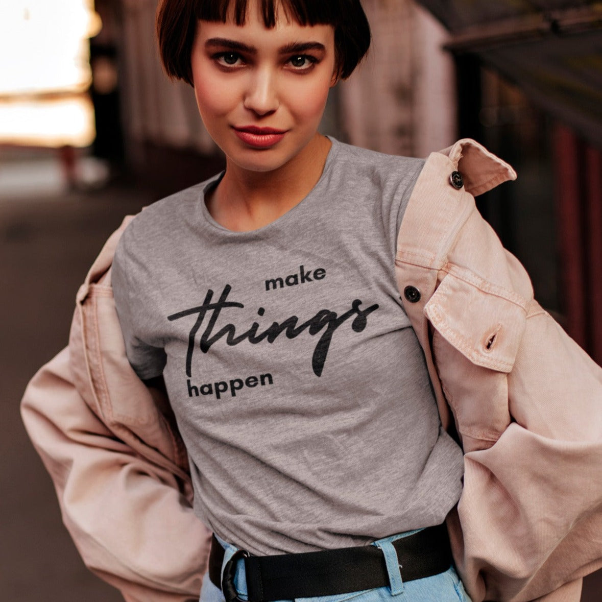 make-things-happen-athletic-heather-t-shirt-women-inspiring-mockup-featuring-a-woman-with-short-hair-posing