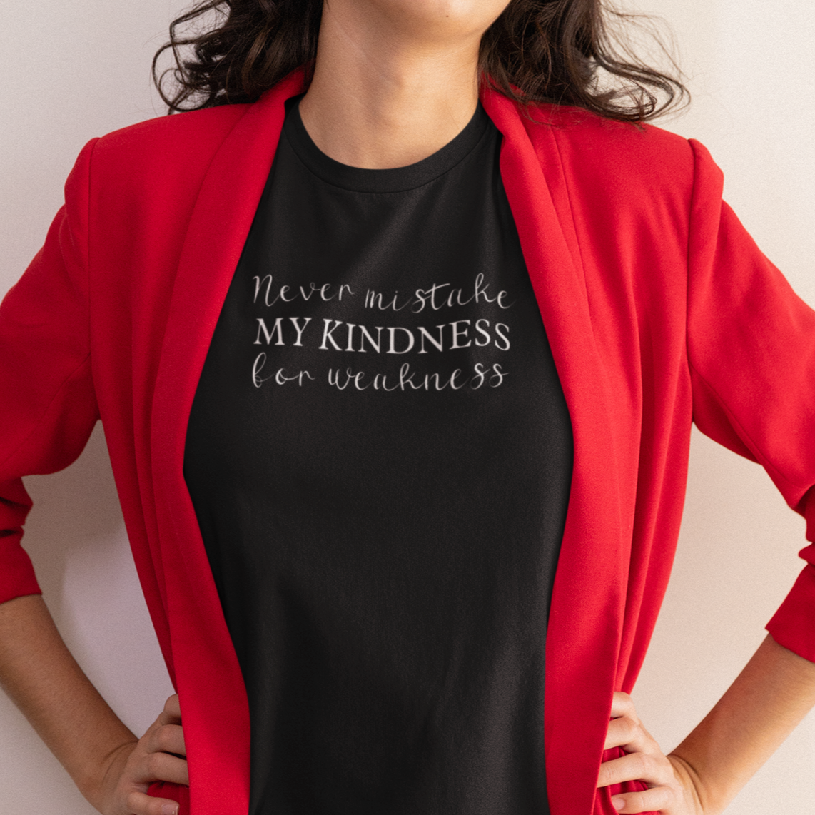 never-mistake-my-kindness-for-weakness-bella-canvas-t-shirt-mockup-of-a-woman-wearing-a-red-blazer