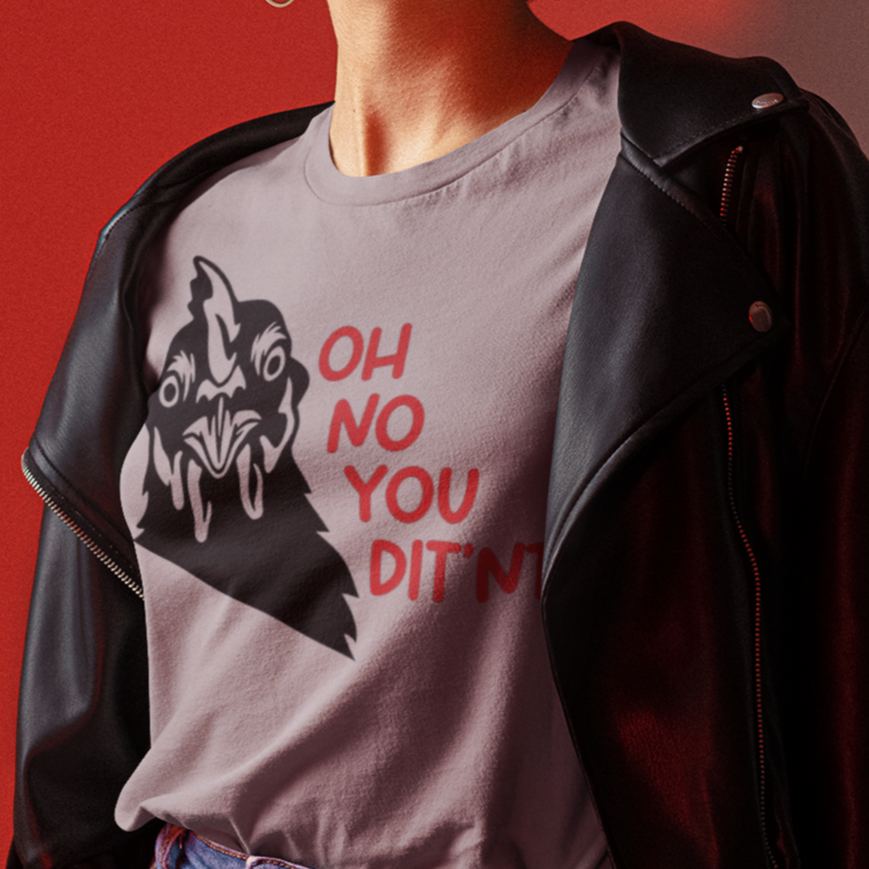 oh-no-you-ditnt-didnt-white-t-shirt-mockup-featuring-a-woman-wearing-a-leather-jacket-and-sunglasses