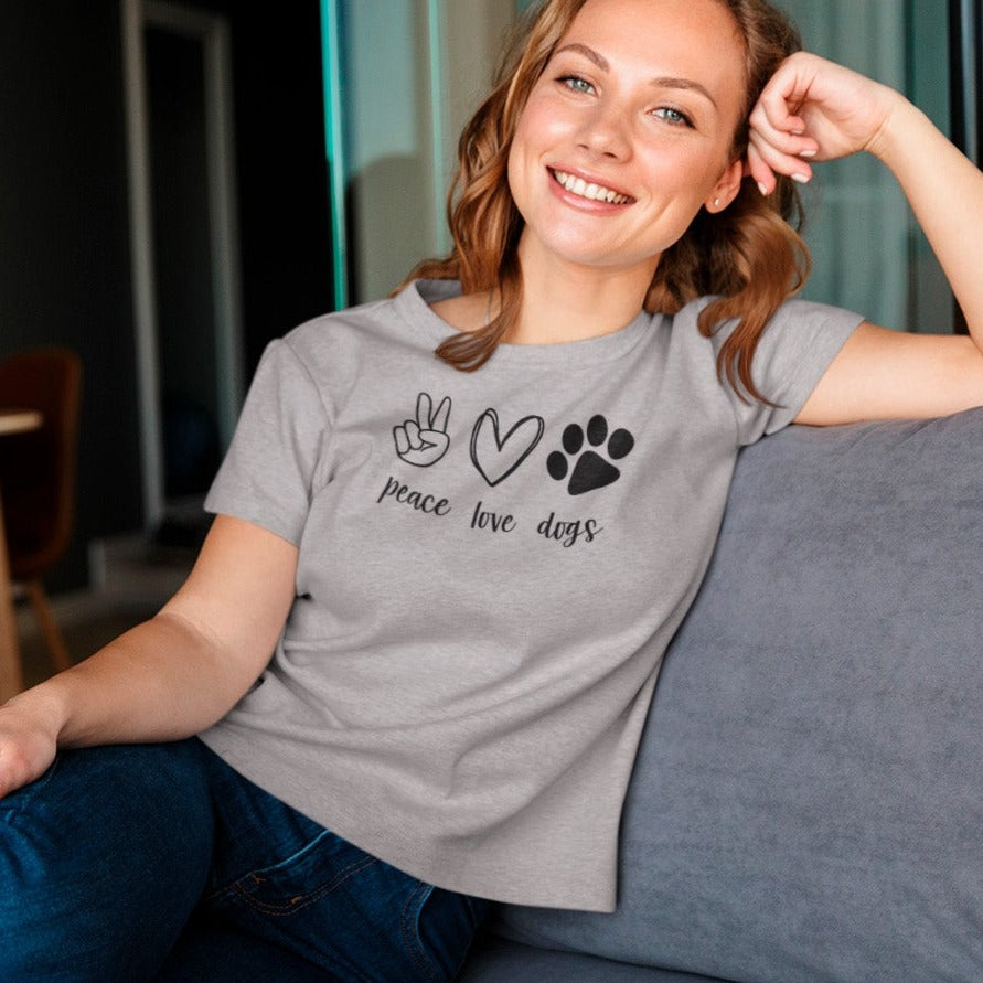 peace-love-dogs-athletic-heather-grey-t-shirt-mockup-of-a-woman-in-a-heather-tee-relaxing-at-home
