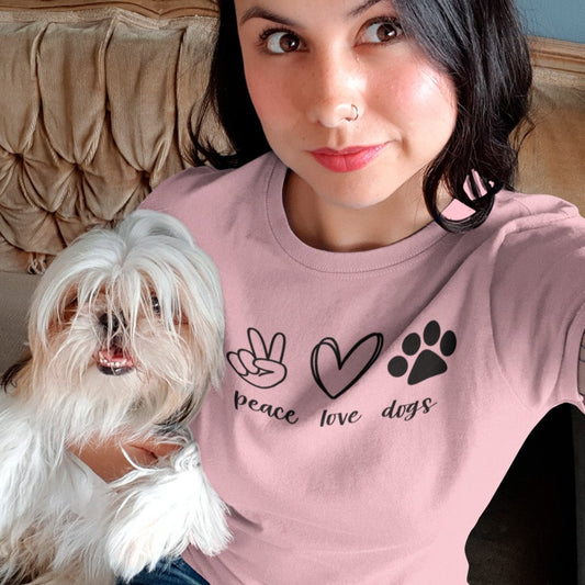 peace-love-dogs-pink-t-shirt-mockup-of-a-pretty-woman-wearing-a-round-neck-tee-while-taking-a-selfie-with-her-dog