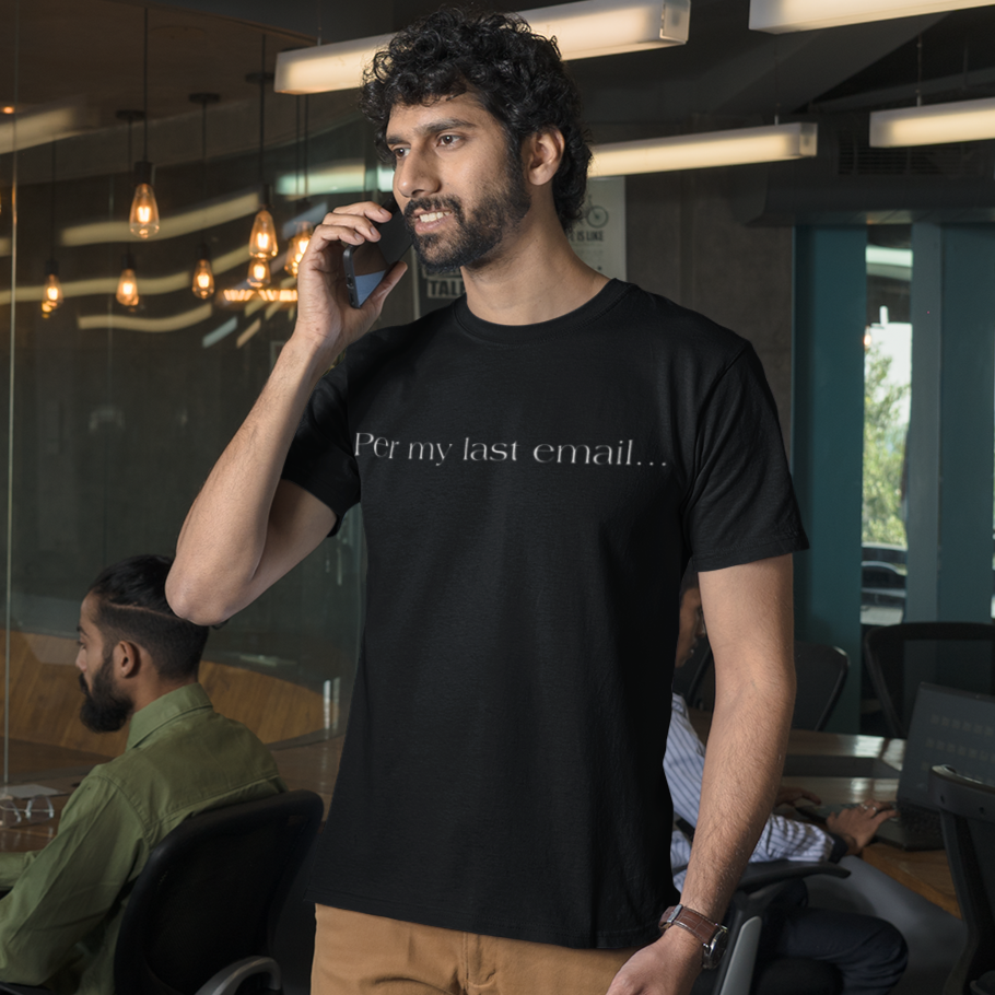 per-my-last-email-black-t-shirt-office-humor-tee-mockup-featuring-a-bearded-man-talking-on-his-smartphone