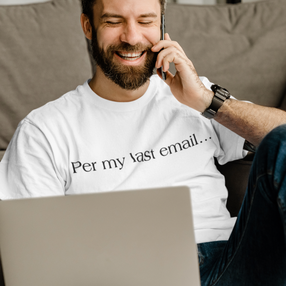 per-my-last-email-white-t-shirt-office-humor-mockup-featuring-a-man-laughing-while-talking-on-the-phone