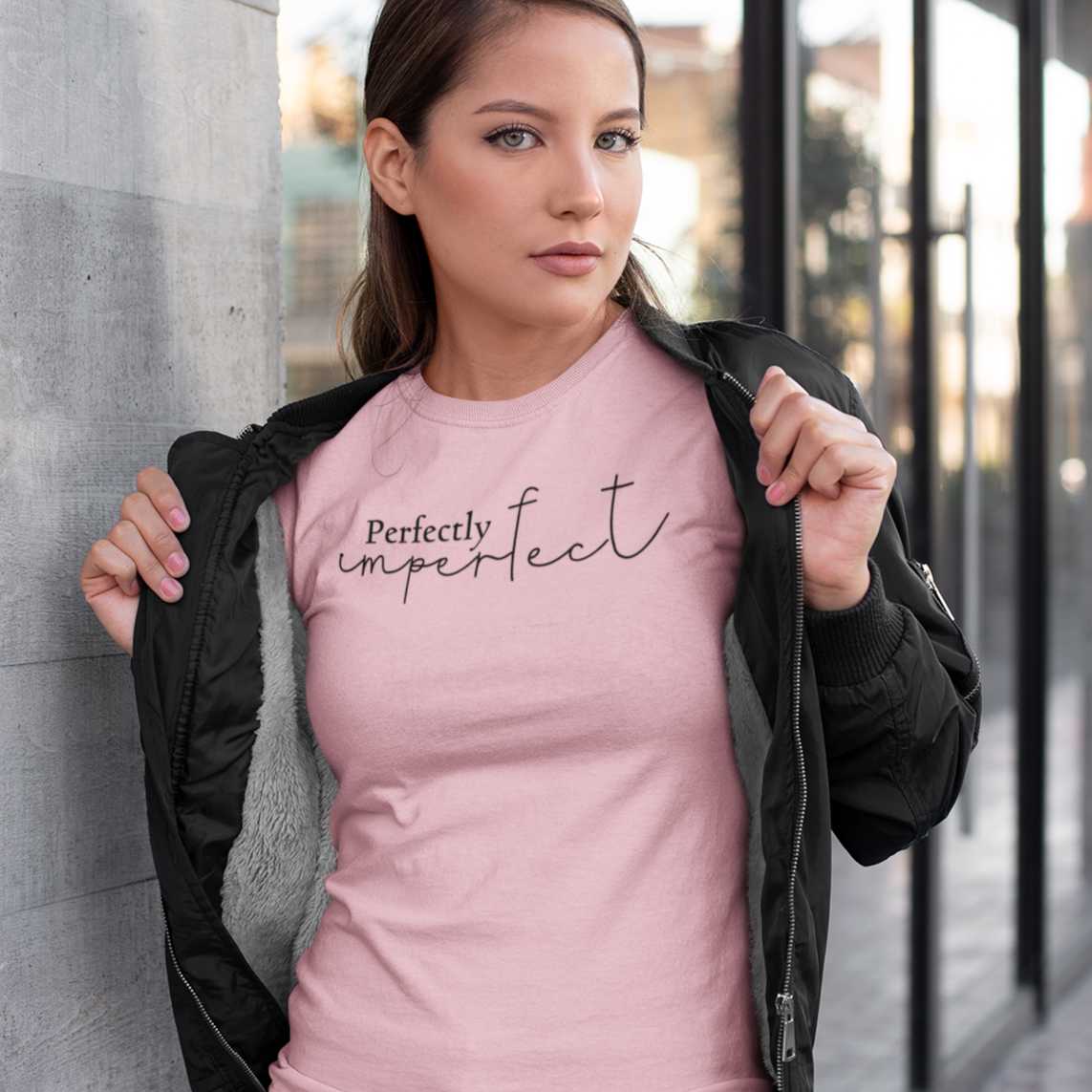 perfectly-imperfect-pink-t-shirt-womens-mockup-of-a-woman-showing-off-the-teet-under-her-bomber-jacket