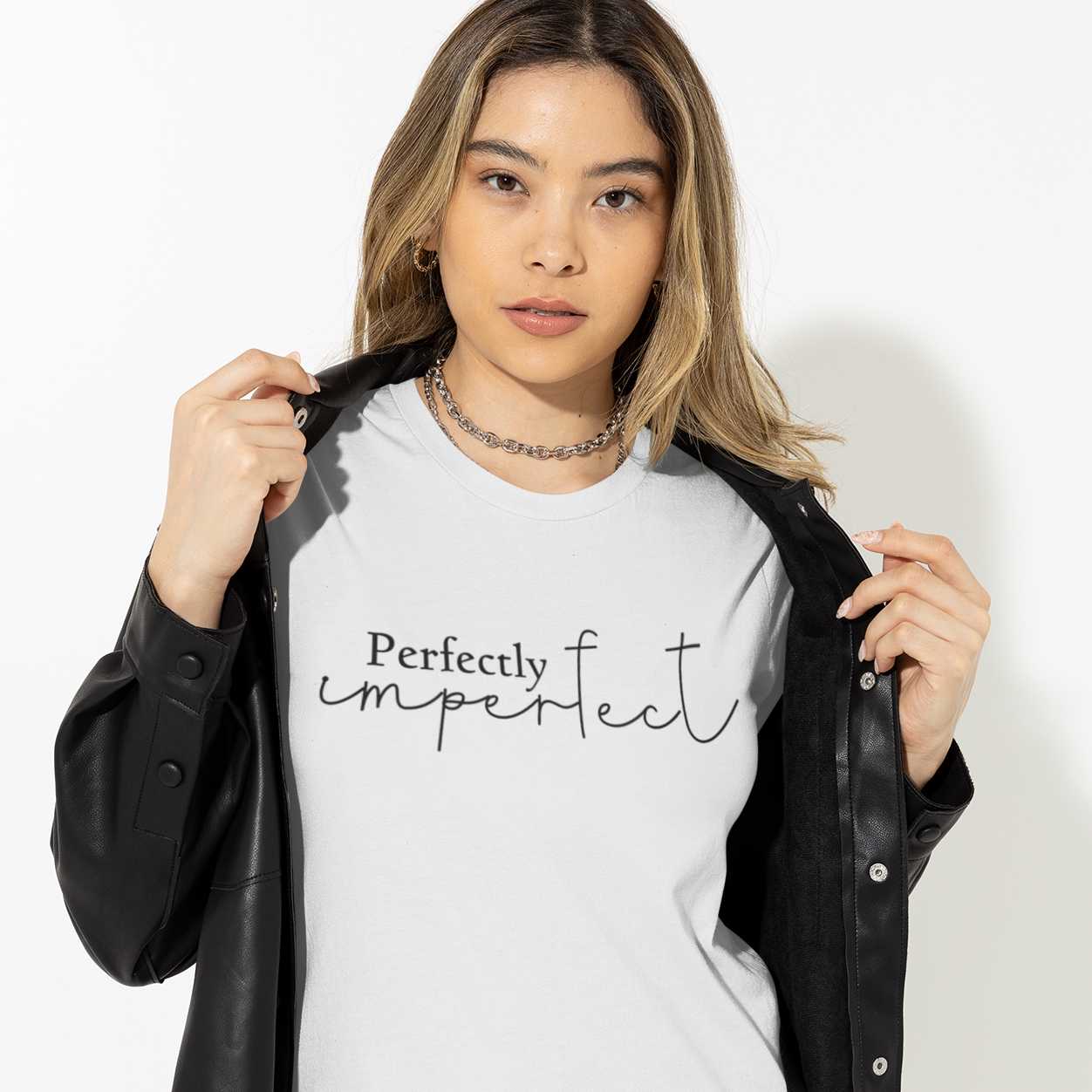 perfectly-imperfect-t-shirt-mockup-of-a-woman-posing-with-a-serious-look-and-a-leather-jacket-