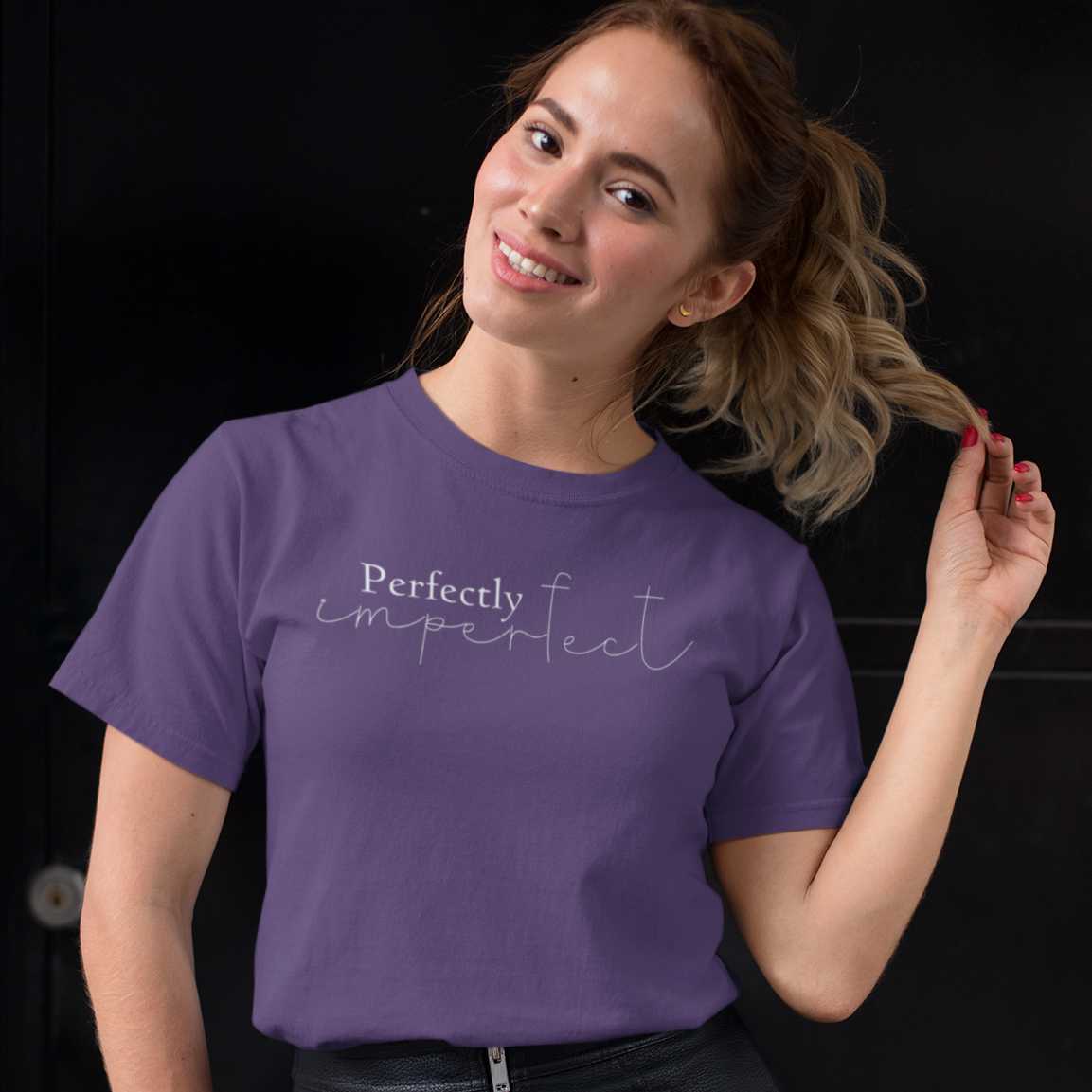 perfectly-imperfect-team-purple-t-shirt-womens-tee-mockup-of-a-girl-with-a-leather-skirt-playing-with-her-hair