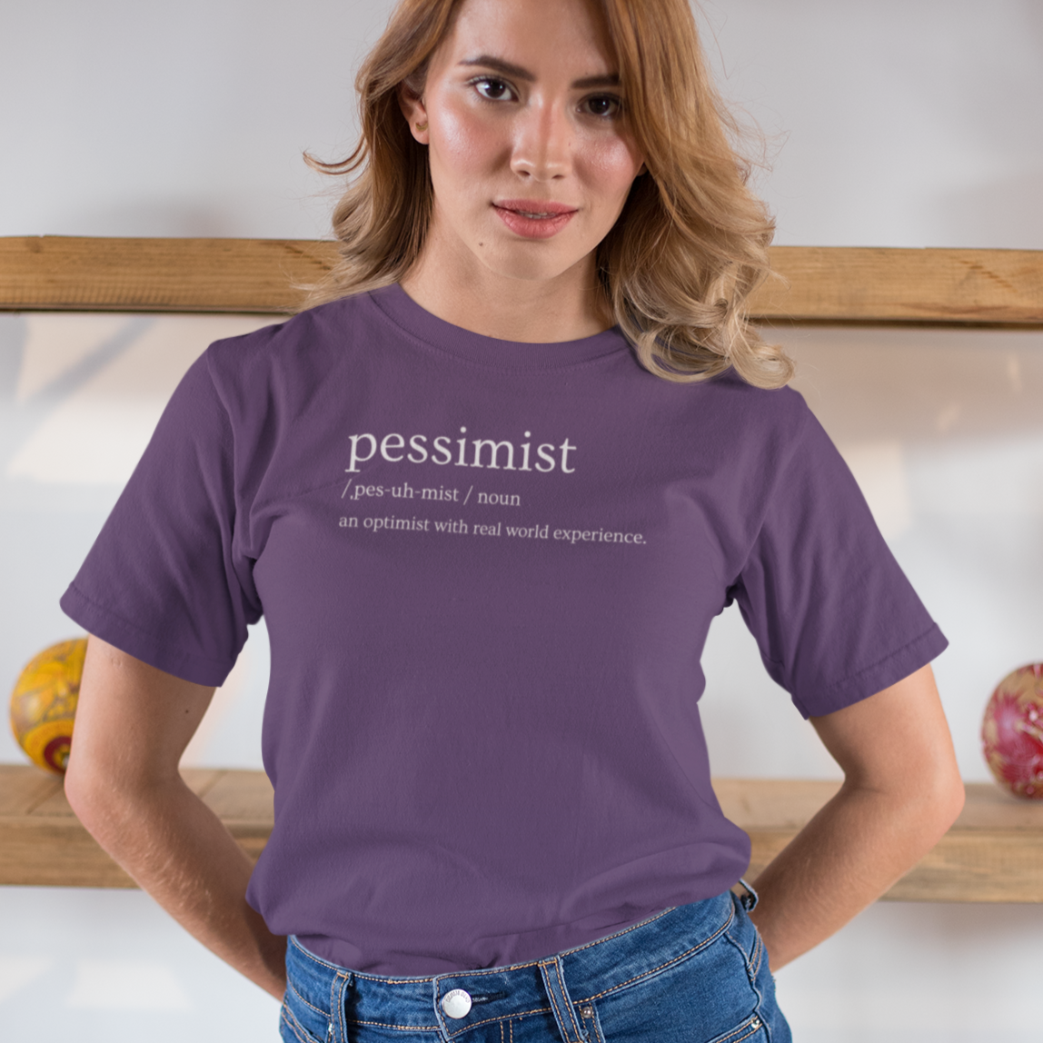 pessimist-an-optimist-with-real-world-experience-team-purple-t-shirt-mockup-of-a-woman-wearing-a-denim-skirt