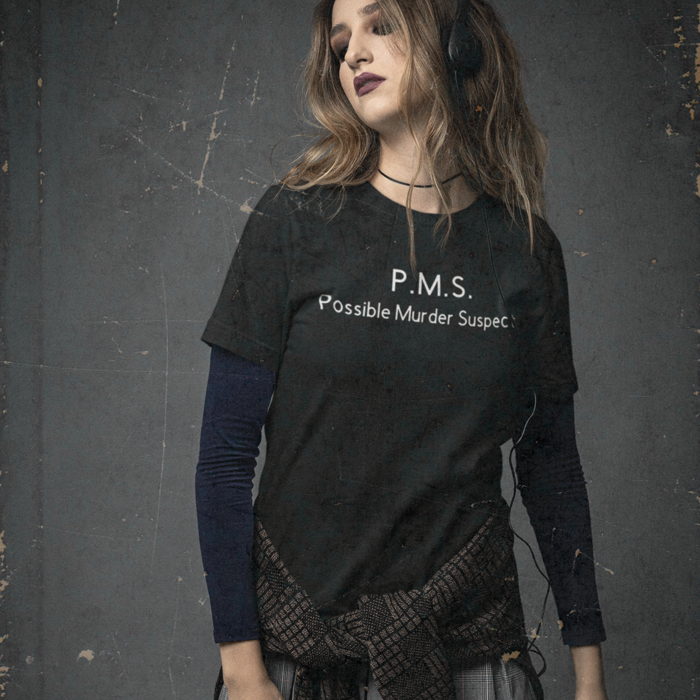 pms-possible-murder-suspect-90s-themed-mockup-of-a-woman-wearing-a-bella-canvas-unisex-tee