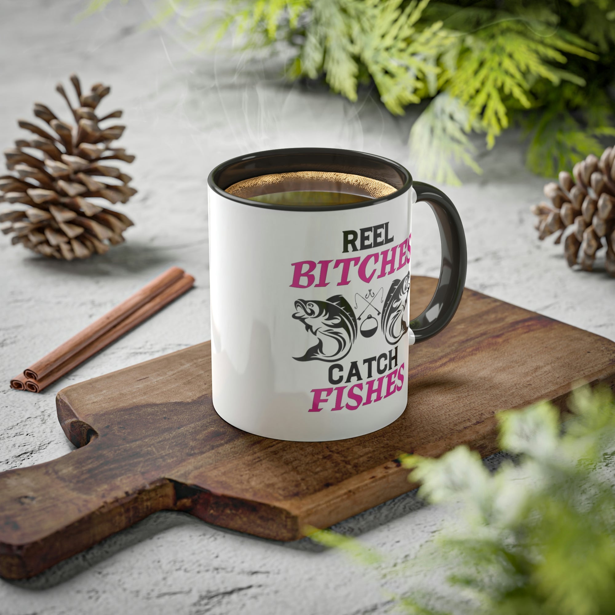 reel-bitches-catch-fishes-glossy-mug-11-oz-orca-fishing-mug-on-a-cutting-board