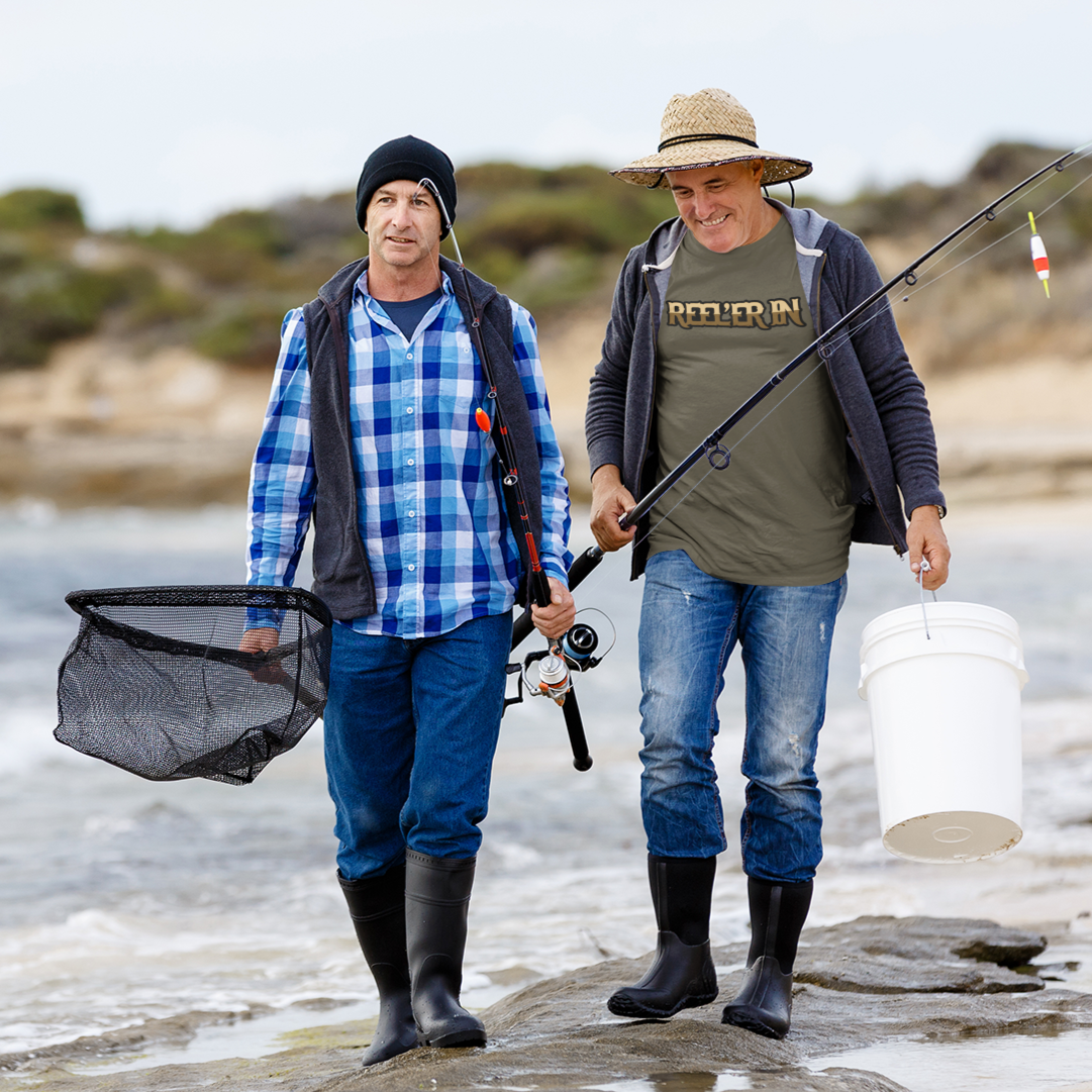 reeler-in-army-green-t-shirt-mockup-of-two-fishermen-walking-by-the-sea-fishing