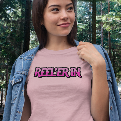 reeler-in-pink-t-shirt-mockup-of-a-happy-young-woman-wearing-denim-fishing