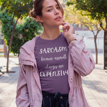 sarcasm-because-assault-charges-are-expensive-team-purple-t-shirt-women-funny-sarcastic-mockup-of-a-girl-with-an-urban-style-posing-at-downtown