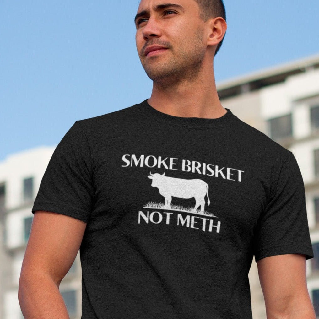 smoke-brisket-not-meth-black-t-shirt-funny-cow-mockup-of-a-young-man-walking-aroundsmoke-brisket-not-meth-black-t-shirt-funny-cow-mockup-of-a-young-man-walking-around