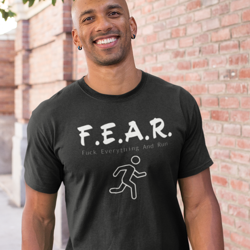t-shirt-mockup-featuring-a-happy-man-walking-under-a-tree