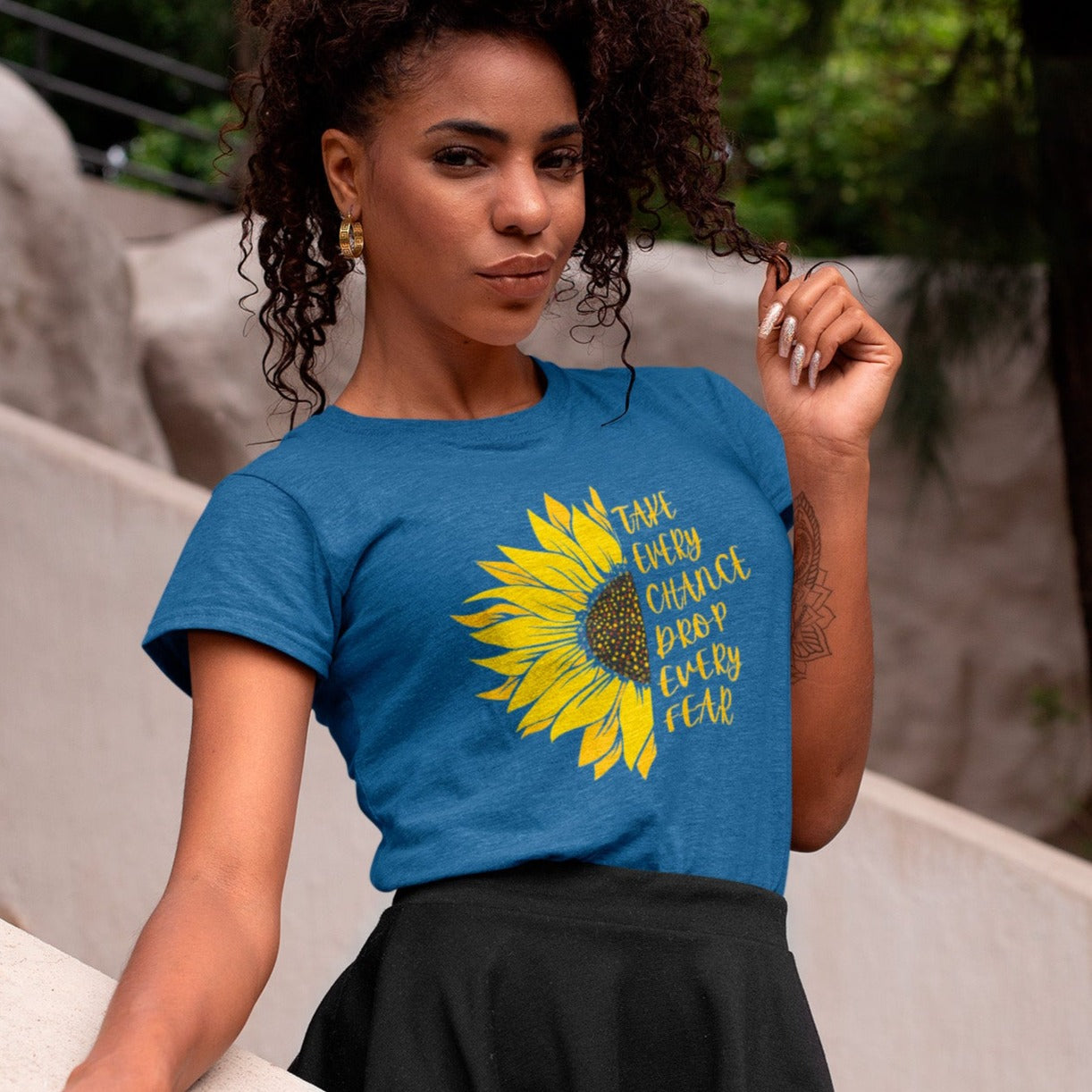 take-every-chance-drop-every-fear-heather-true-royal-blue-t-shirt-sunflower-mockup-of-a-classy-woman-at-a-park-mockup-of-a-classy-woman-at-a-park