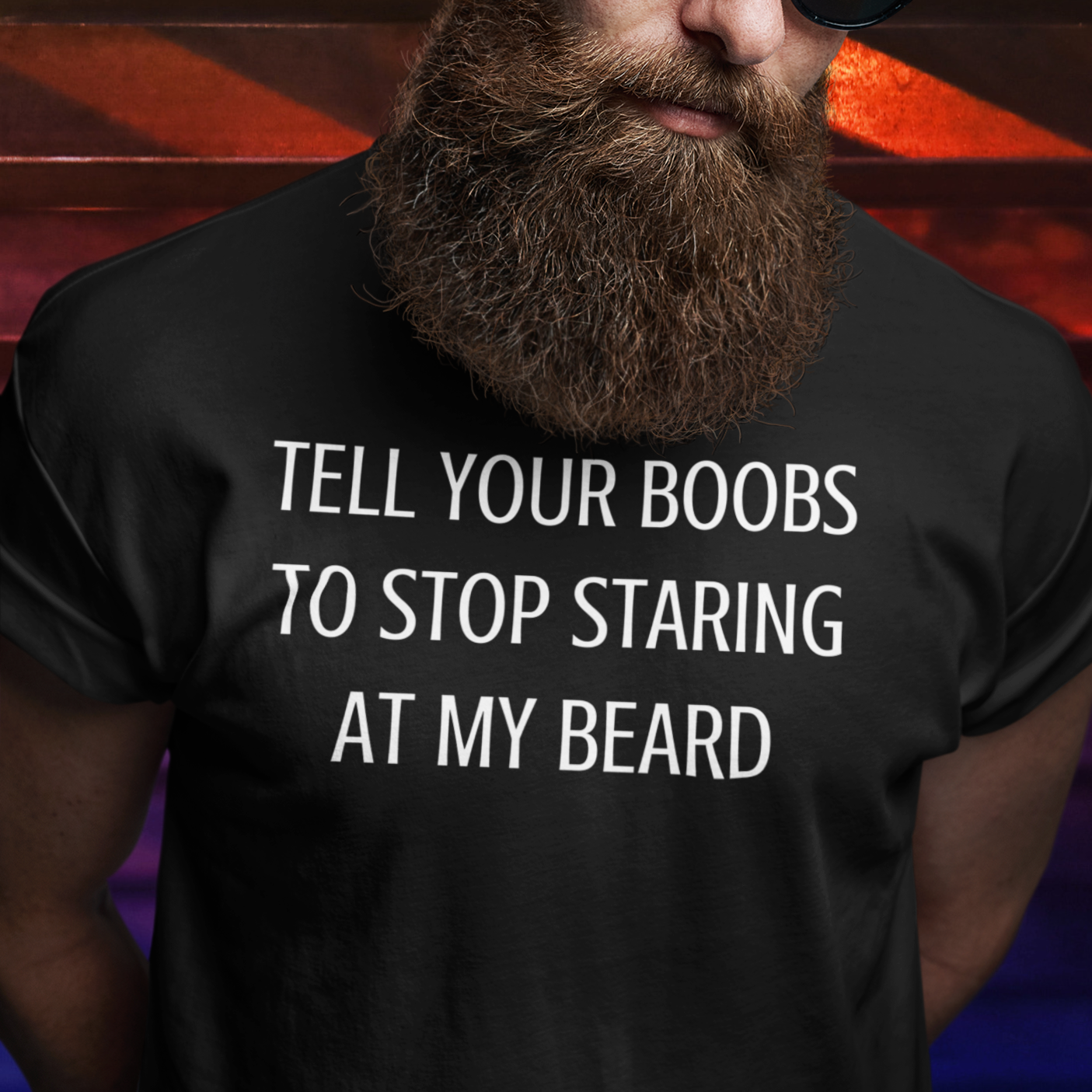 tell-your-boobs-to-stop-staring-at-my-beard-black-t-shirt-mens-funny-mockup-of-a-man-with-a-long-beard-and-sunglasses