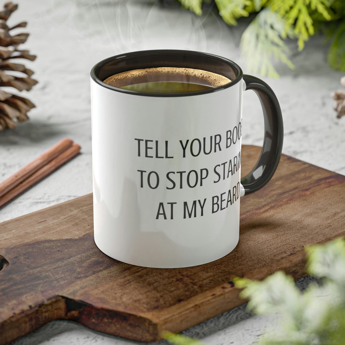 tell-your-boobs-to-stop-staring-at-my-beard-glossy-mug-11-oz-coffee-funny-mockup-on-a-cutting-board