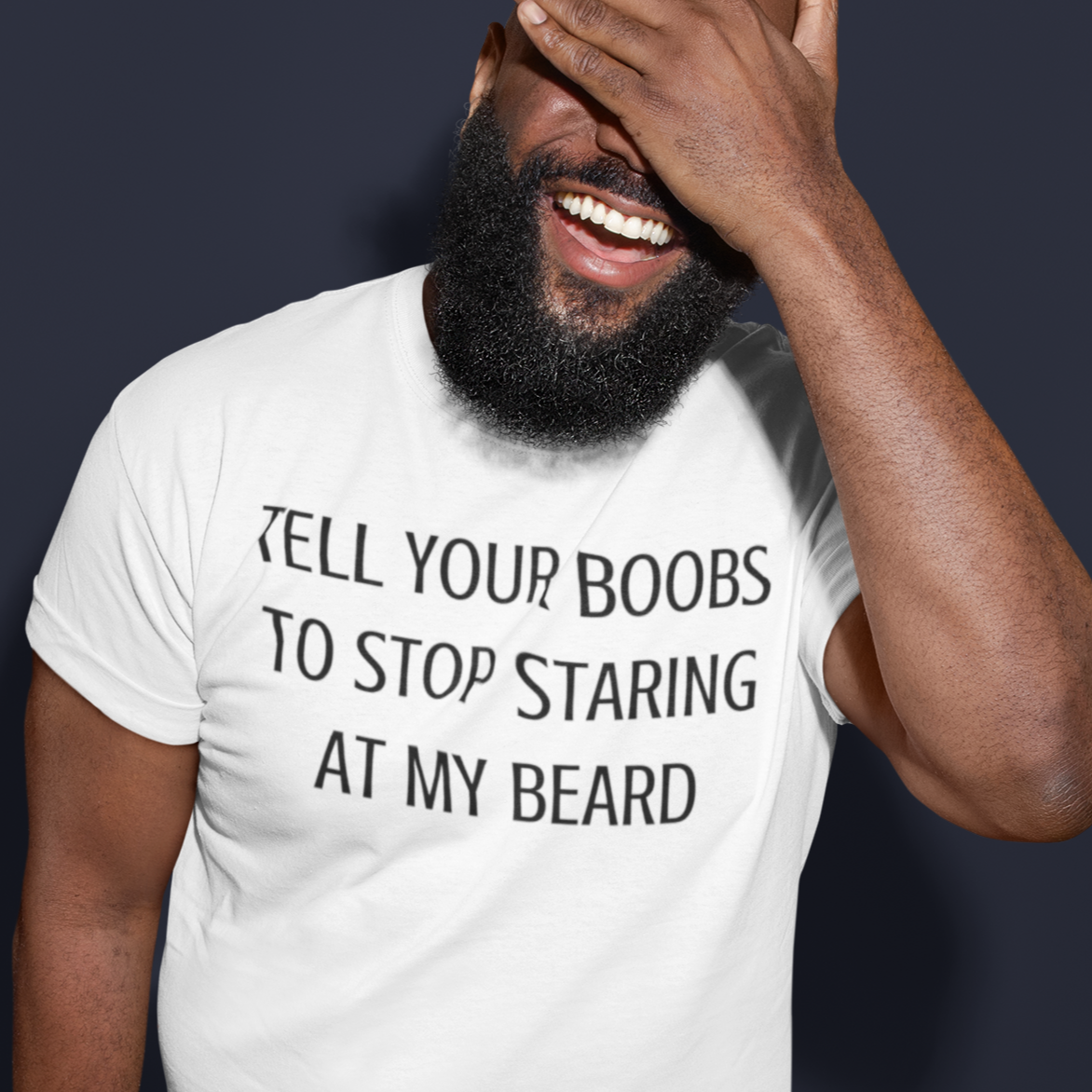 tell-your-boobs-to-stop-staring-at-my-beard-white-t-shirt-mens-funny-mockup-of-a-man-with-beard-laughing-while-covering-his-face