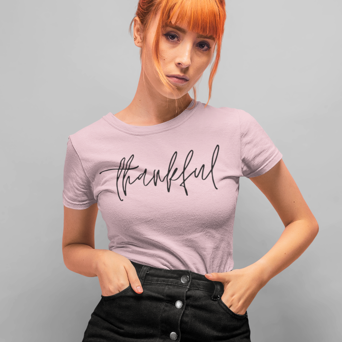    thankful-pink-t-shirt-womens-inspiring-mockup-of-a-red-hair-girl-in-a-dark-skirt-posing-at-a-studio