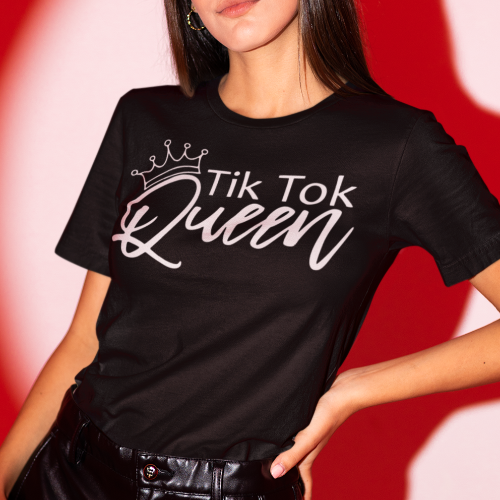 tik-tok-queen-black-t-shirt-womens-mockup-featuring-a-fashionable-woman-posing-in-a-red-light-studio