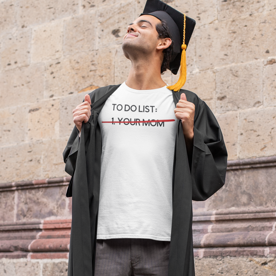 to-do-list-your-mom-t-shirt-mockup-featuring-a-proud-young-man-wearing-a-graduation-gown