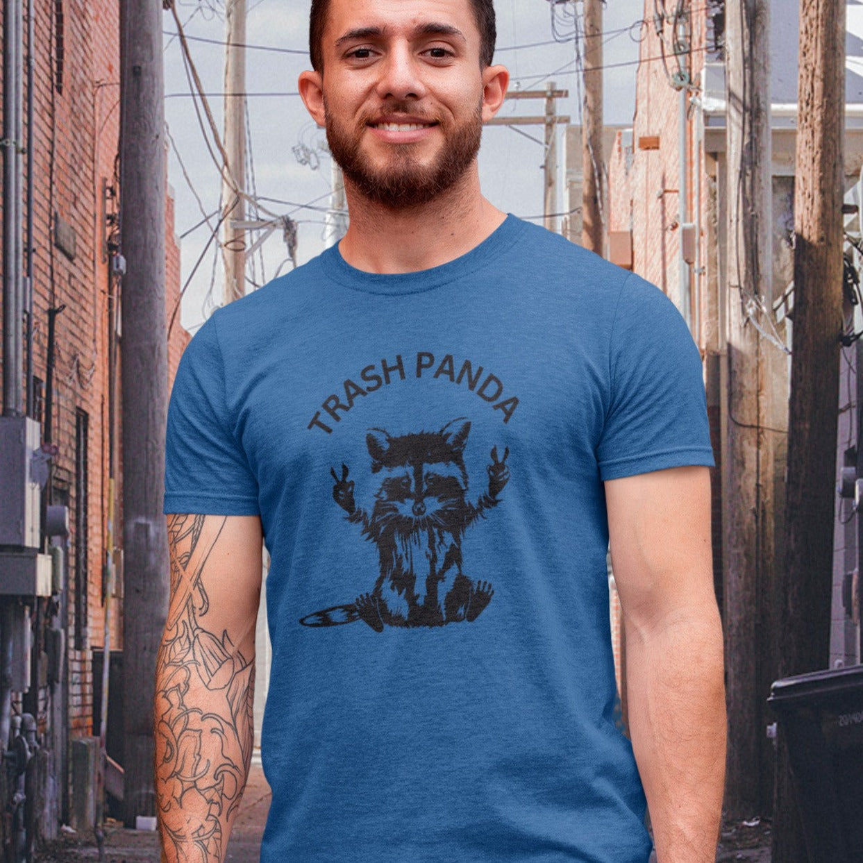 trash-panda-racoon-heather-true-royal-t-shirt-unisex-tee-mockup-featuring-a-tattooed-bearded-man