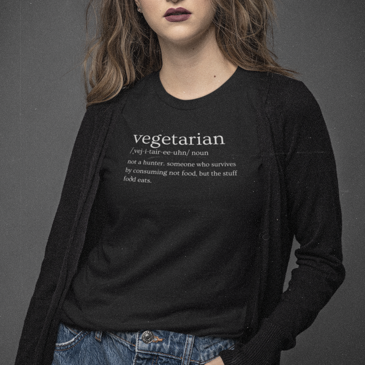 vegetarian-definition-not-a-hunter-someone-who-survives-by-consuming-not-food-but-the-stuff-food-eats-bella-canvas-t-shirt-featuring-a-serious-young-woman