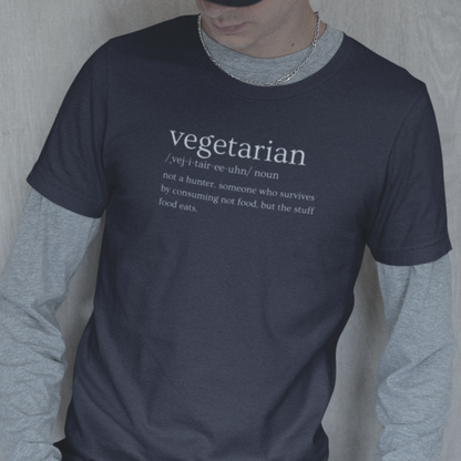 vegetarian-definition-not-a-hunter-someone-who-survives-by-consuming-not-food-but-the-stuff-food-eats-bella-canvas-t-shirt-mockup-featuring-an-e-boy-against-a-wall