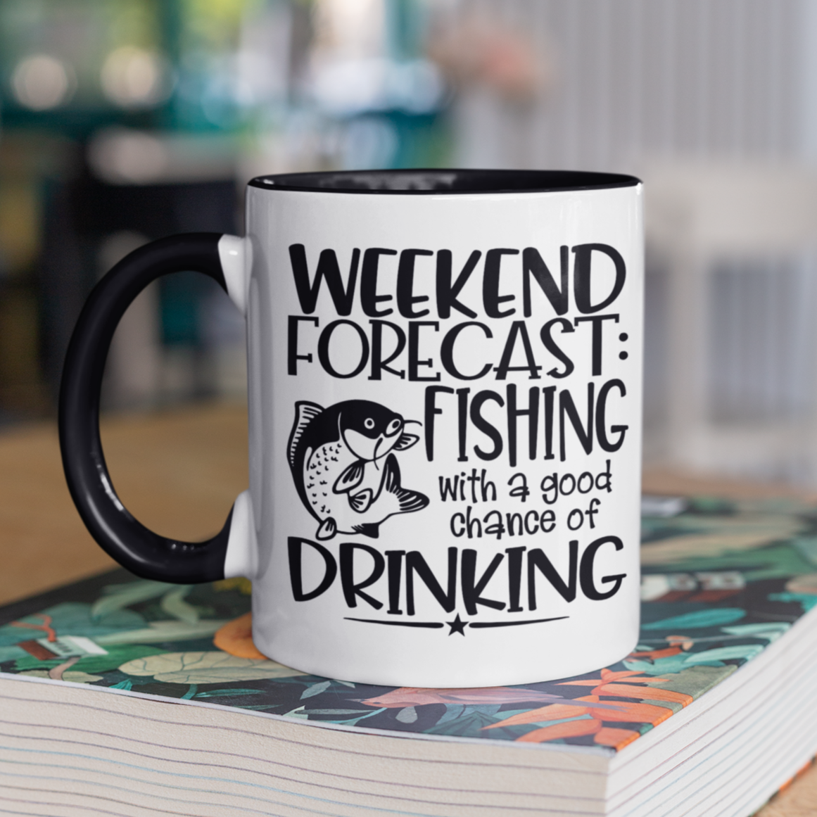 weekend-forecast-fishing-with-a-good-chance-of-drinking-glossy-mockup-of-a-two-toned-11-oz-coffee-mug-mockup-on-a-table